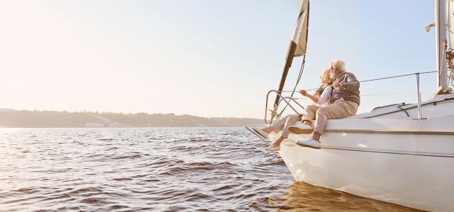 Happy retirement people on a boat